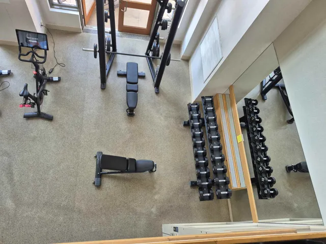 Workout area featuring baseboards