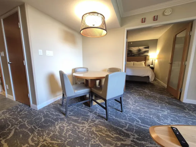Dining room featuring crown molding and baseboards