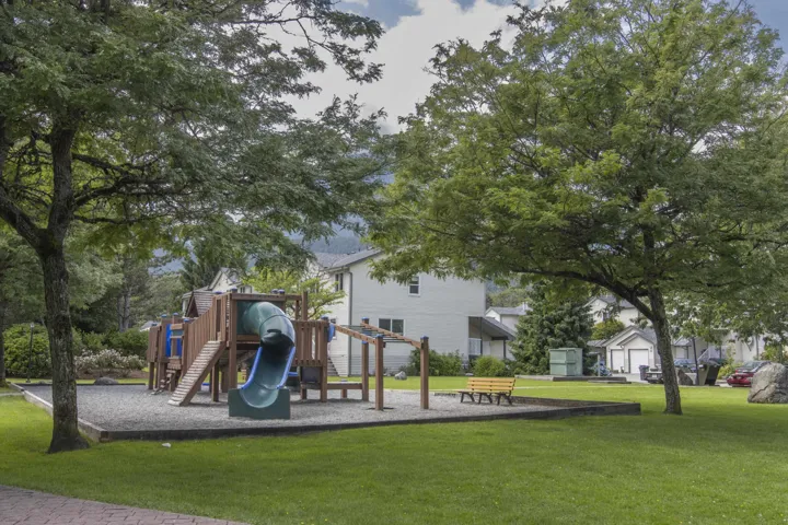 Community playground featuring a yard
