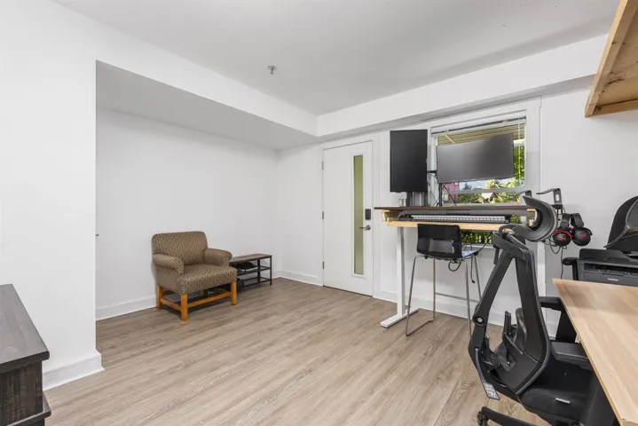 Great designated space for work from home office or health/wellness practitioner to see clients. Direct access to Britannia Ave. Easily removable wall if more garage / storage space is desired