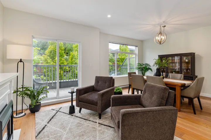 Dining space featuring plenty of natural light, light wood finished floors, a chandelier, and recessed lighting