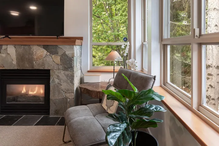 Floor-to-ceiling windows with wood sills