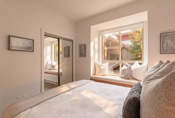 Built-in window seat with a wood-finish base and recessed window