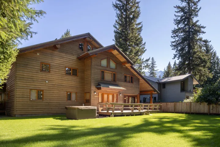 Rear view of property with a deck
