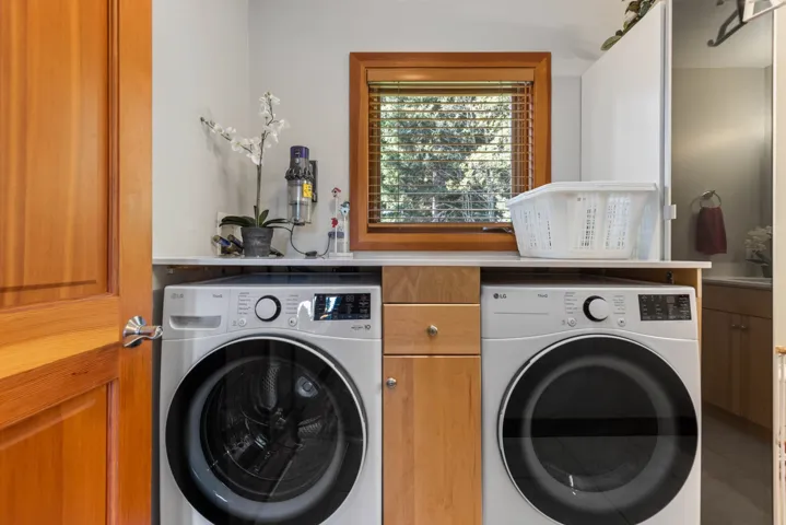 Washroom with separate washer and dryer