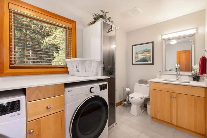 Bathroom with vanity and light tile patterned floors