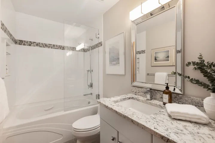 Full bathroom with vanity and shower / tub combination