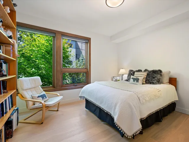 Bedroom with light wood-style floors