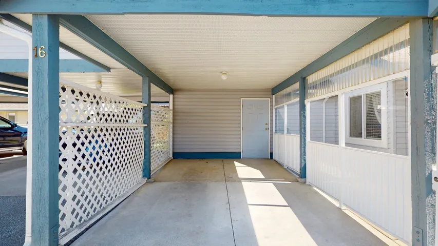 View of patio featuring a carport