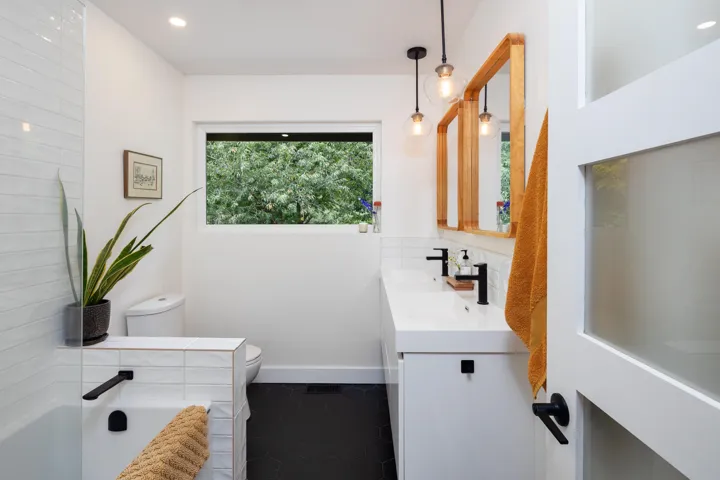 Full bathroom with vanity, a tub to relax in, recessed lighting, and tile patterned floors