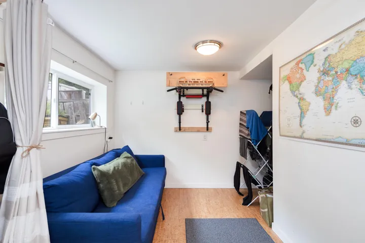 Living area featuring wood finished floors and baseboards