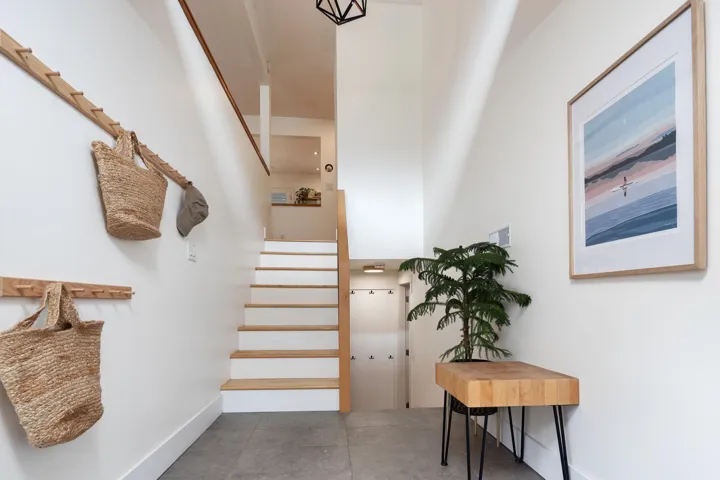 Stairway featuring baseboards