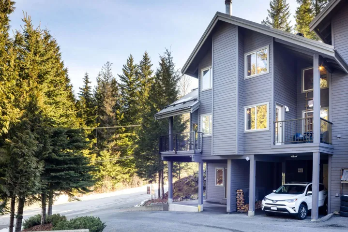 View of front of home featuring a balcony