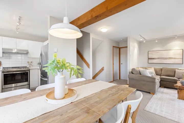 Dining area with beamed ceiling