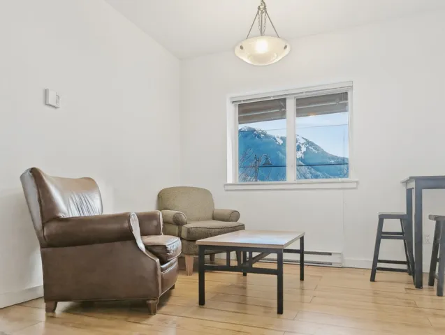 Sitting room with light wood finished floors