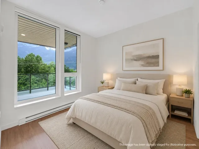 Bedroom featuring expansive windows, wood-finish flooring, and white baseboard trim