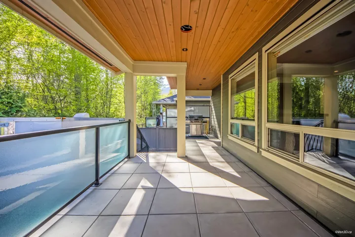 Balcony featuring exterior kitchen