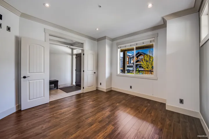 Unfurnished bedroom featuring baseboards, recessed lighting, wood finished floors, and ornamental molding