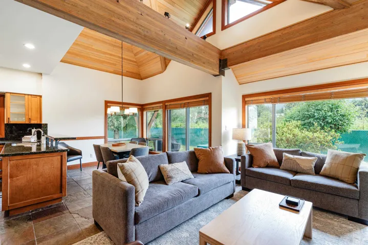 Vaulted wood-paneled ceiling with exposed wood beams