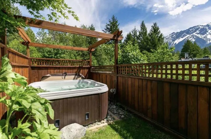 hot tub and a mountain view