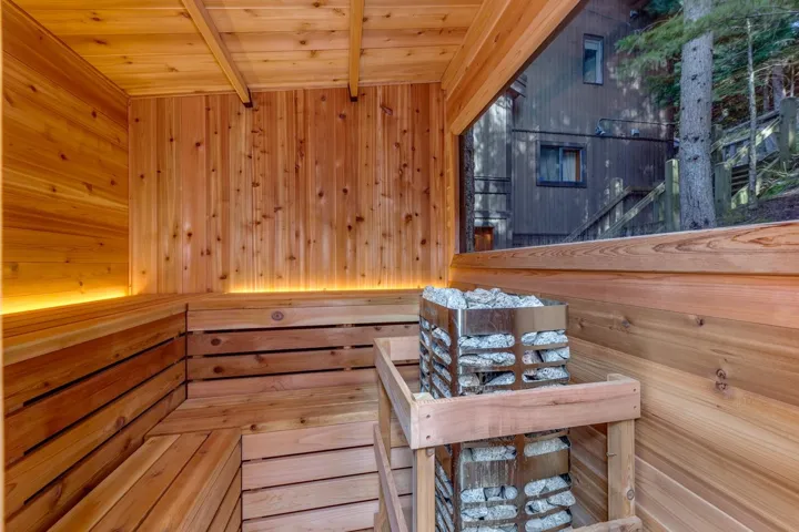 Relaxing sauna with wood walls and wooden ceiling