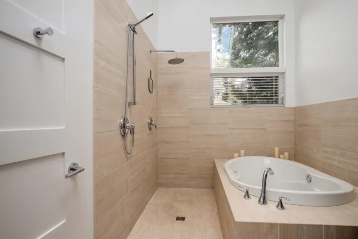Large soaker and tile shower.