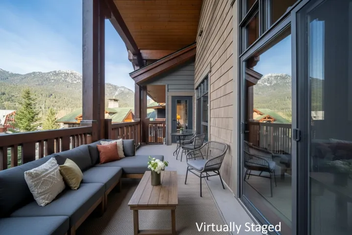 Balcony with an outdoor hangout area and a mountain view