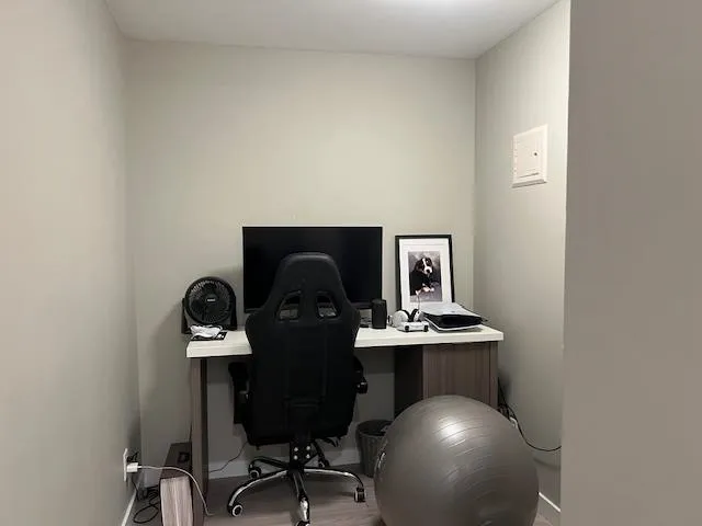 Office area with wood finished floors