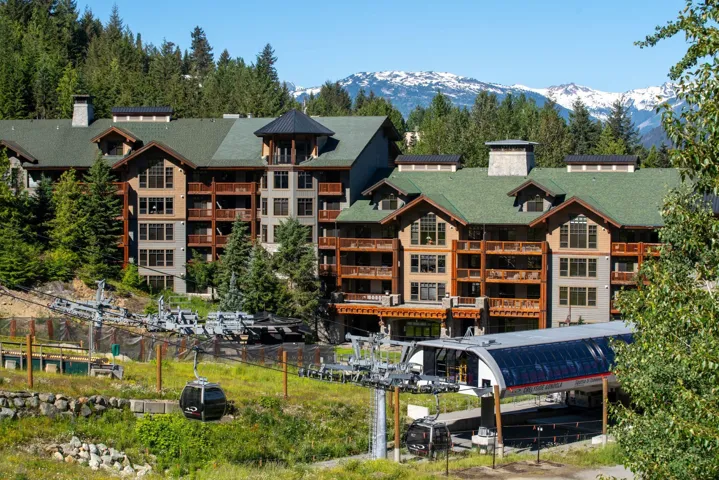 View of property with a mountain view