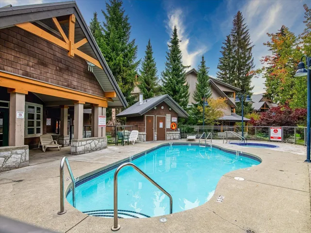 Community pool with a patio area
