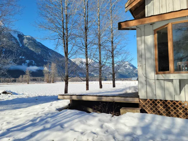View from back deck featuring a mountain backdrop