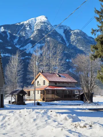 View of main house from in front of barn