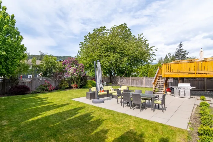 View of yard featuring a patio area and stairway