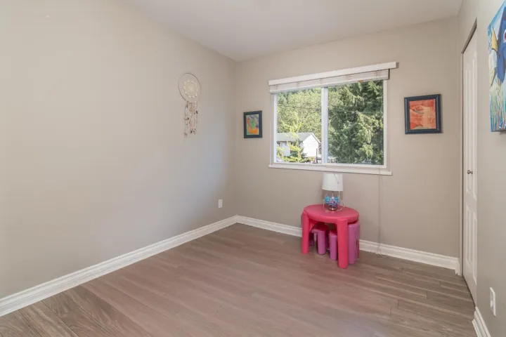 Spare room with wood finished floors and baseboards