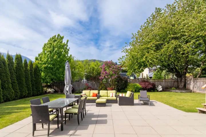 View of patio with an outdoor living space and outdoor dining area