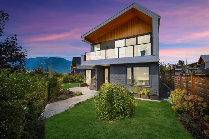 Contemporary home featuring a balcony and a mountain view