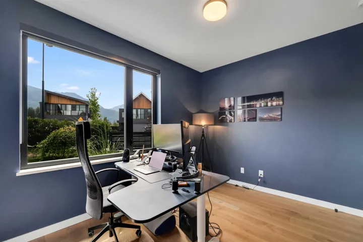 Bedroom/Office with light wood-style flooring and baseboards