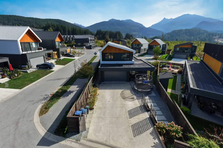 Aerial view of residential area with a mountain backdrop