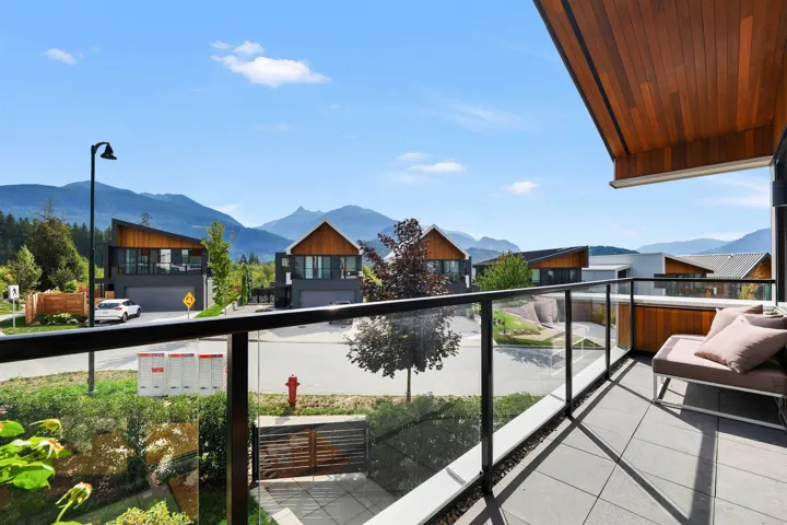 Balcony featuring a mountain view and a residential view