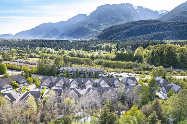 Mountain view featuring a heavily wooded area and nearby suburban area