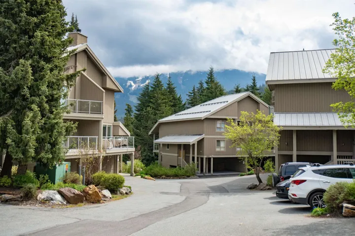 Multi-story residences featuring contemporary siding and metal roofing