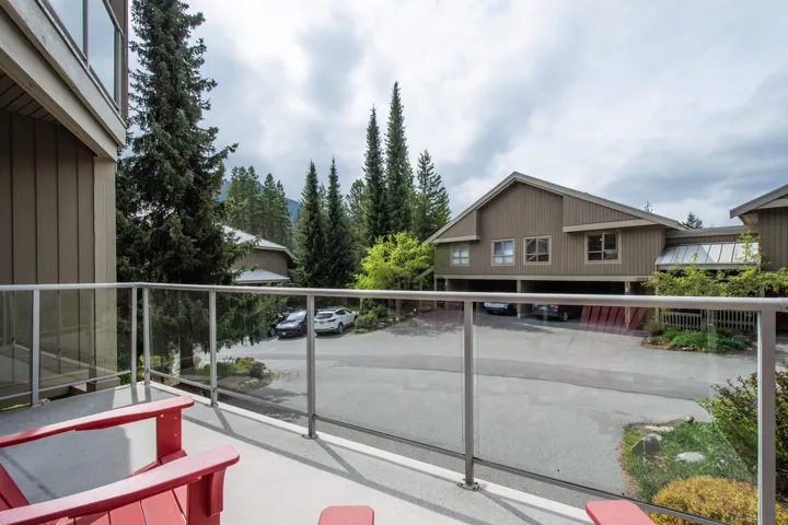 Outdoor deck featuring a glass and aluminum railing system