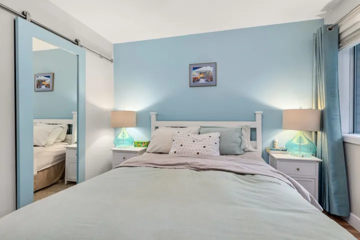Bedroom featuring a barn door
