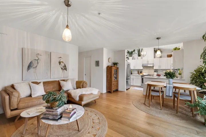 Living area with light wood finished floors