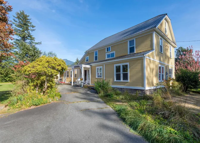 View of front of home with metal roof
