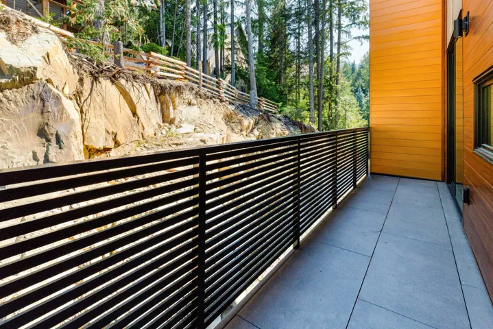 Balcony with view of scattered trees