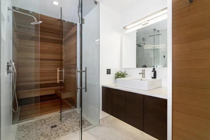 Full bath featuring vanity, a sauna / steam room, a stall shower, and recessed lighting