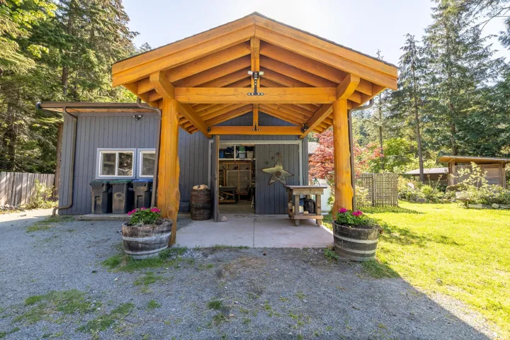 Exterior space with an outbuilding and fence