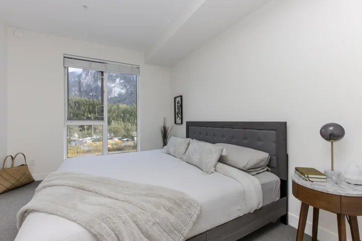 Bedroom with carpet flooring and baseboards