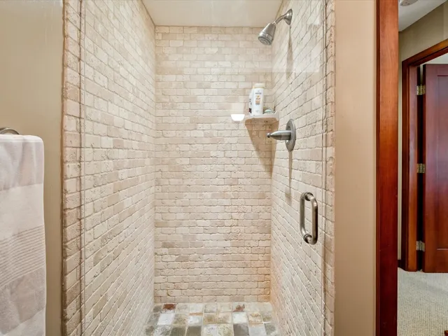 Bathroom featuring a stall shower